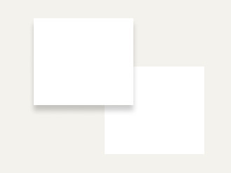 The lower corner of a rectangle is superimposed over another rectangle