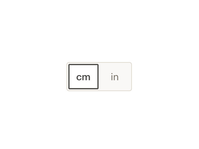 A toggle button with two segments labeled centimeters and inches.